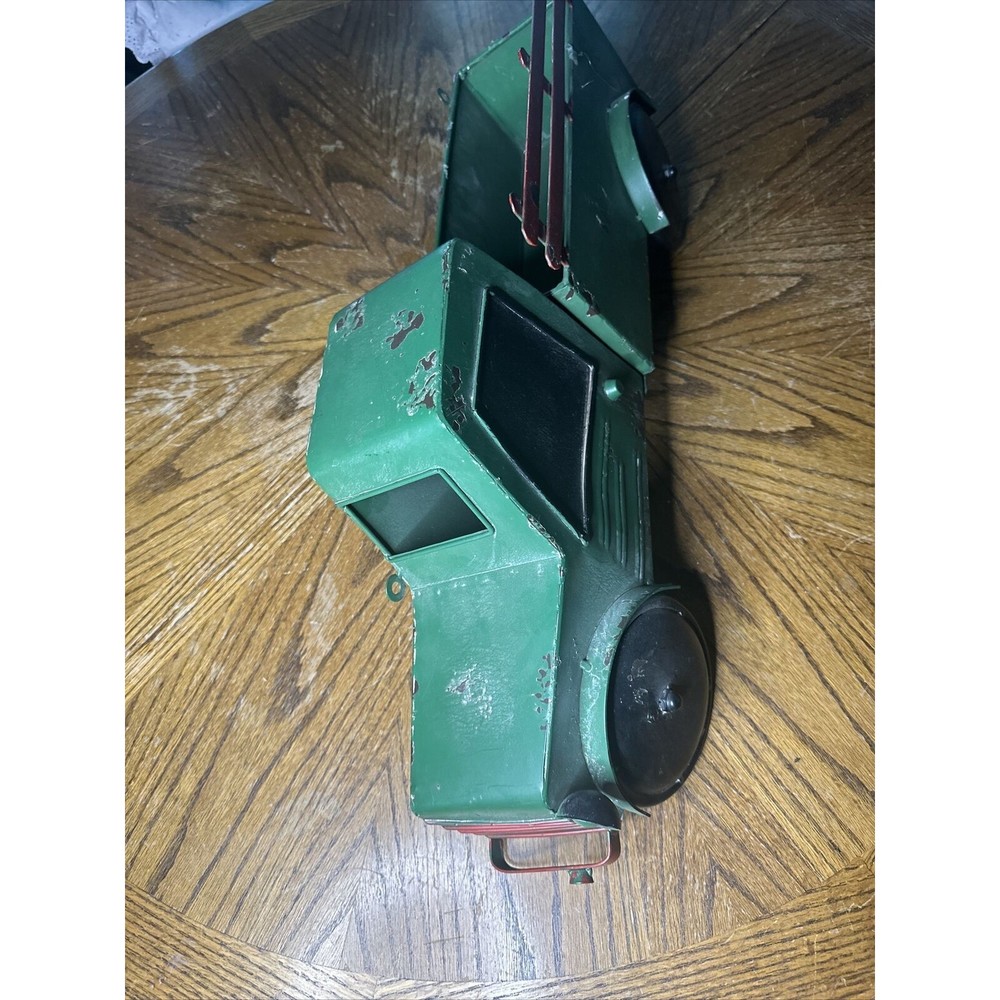Distressed green wall truck shelf